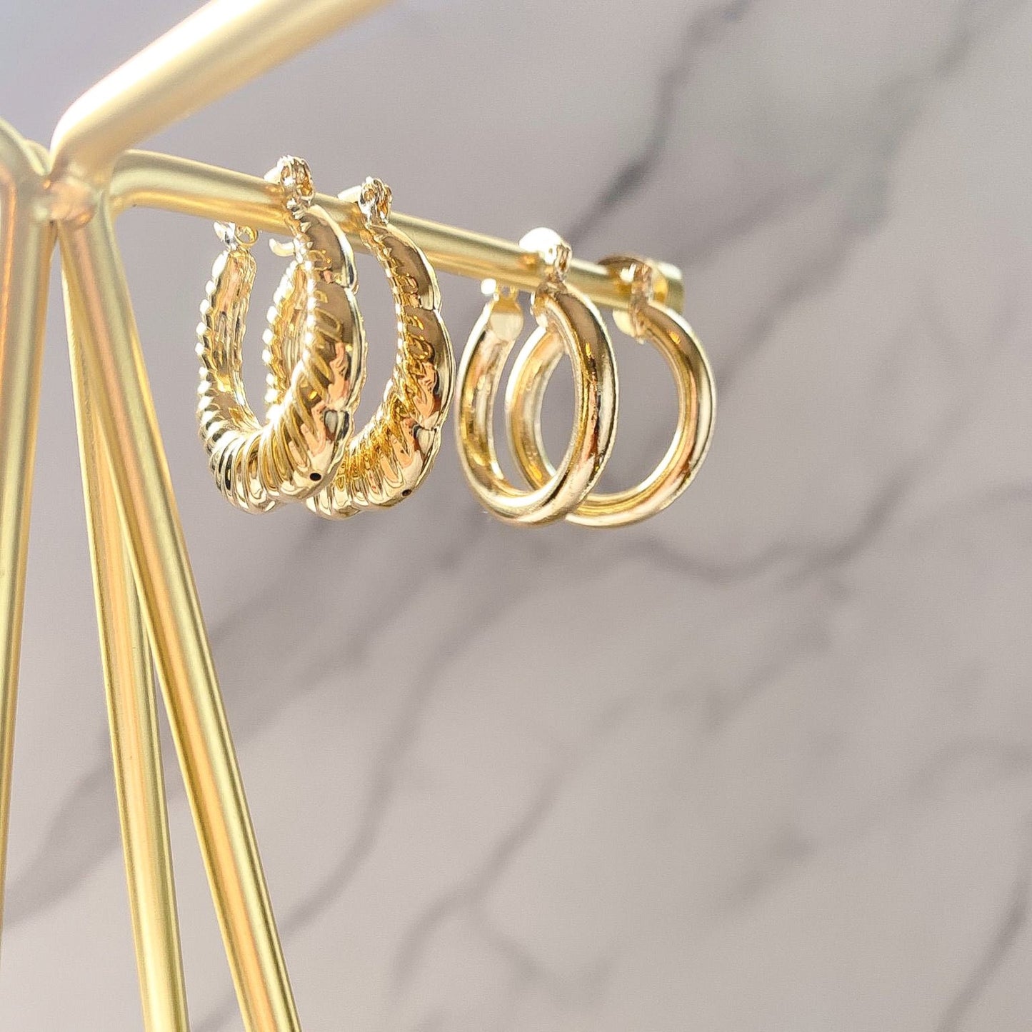 Gold-filled hoops collection, made in Brazil, hypoallergenic and water-resistant by ISVI Boutique Miami