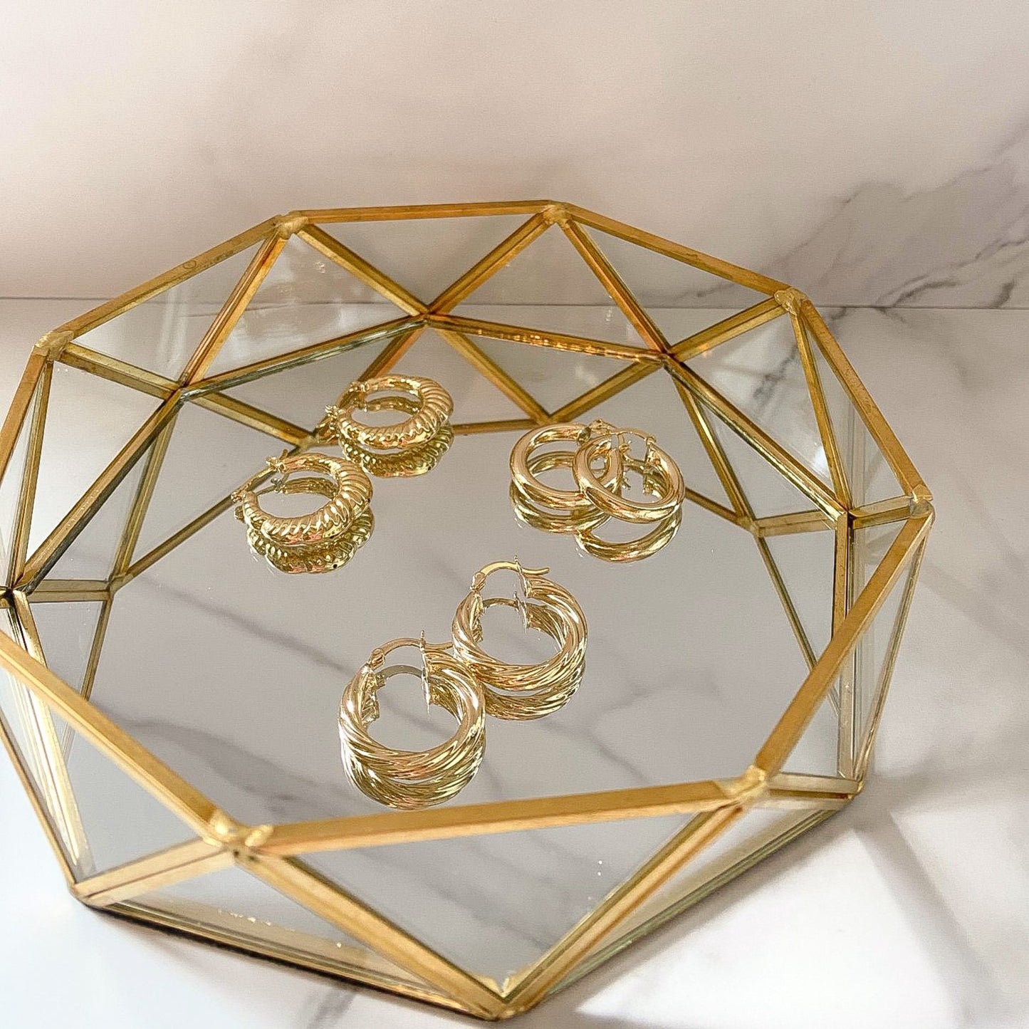 Three gold-filled hoops earings, made in Brazil, hypoallergenic and water-resistant by ISVI Boutique Miami