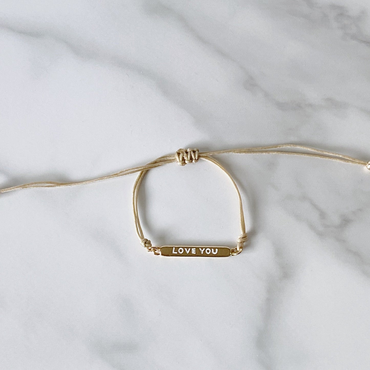 Golden cotton cord bracelet, and "love you" gold-plated plaque, isvi boutique