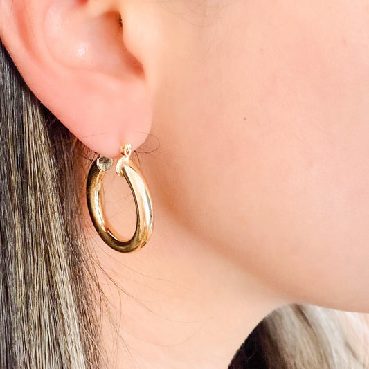 Chunky gold-filled hoops made in Brazil, hypoallergenic and water-resistant sold by ISVI Boutique Miami