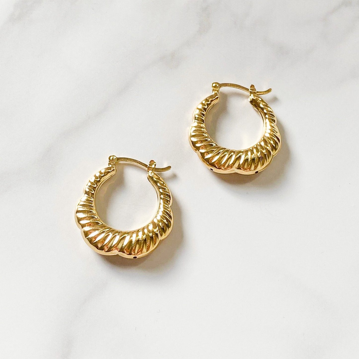 Croissant gold-filled hoops made in Brazil, hypoallergenic, water-resistants, and stylish,  by ISVI Boutique Miami