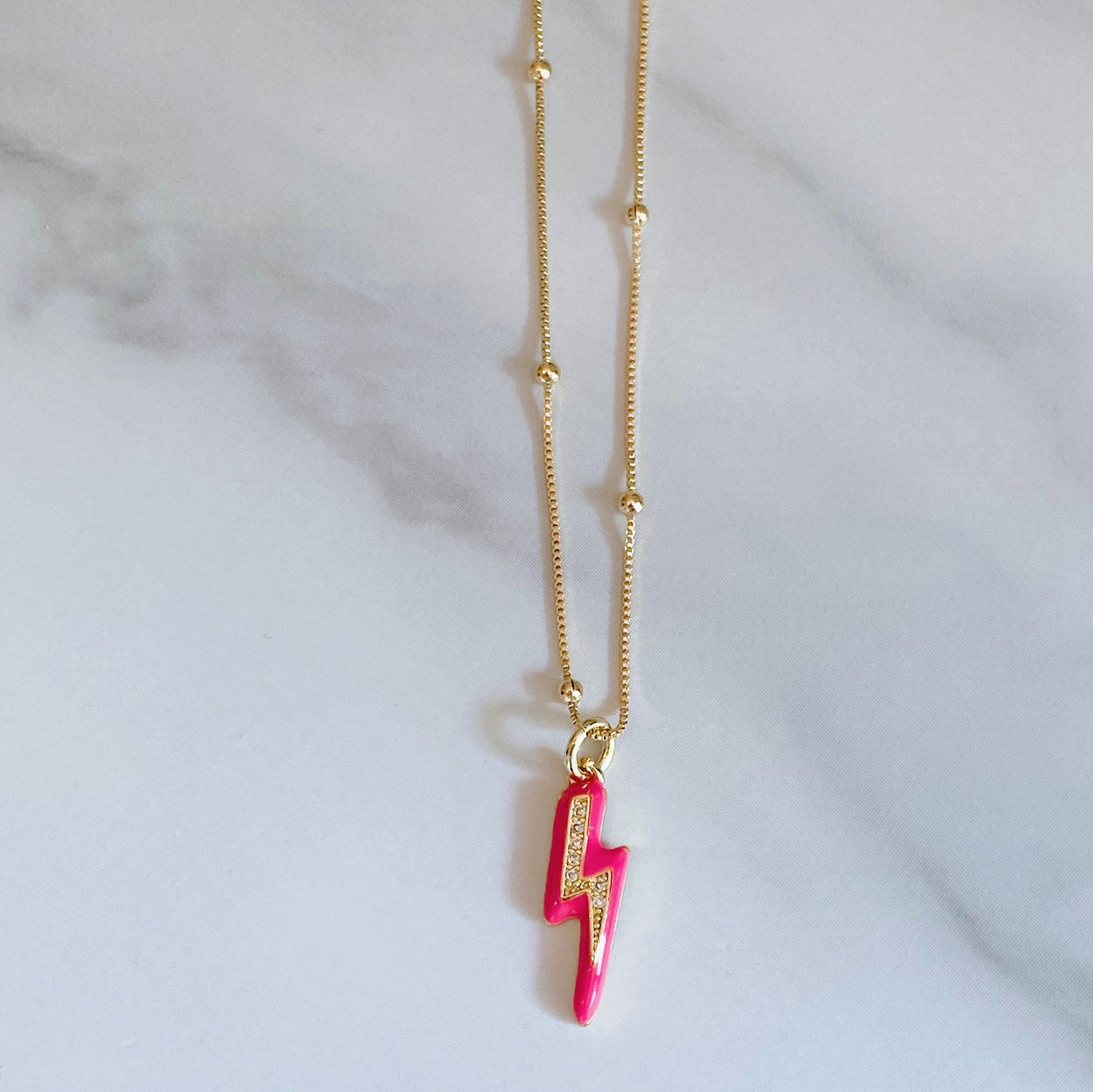 Jens lighting bold necklace, pink enamel, gold-plated bold, gold-foilled necklace by ISVI Boutique Miami