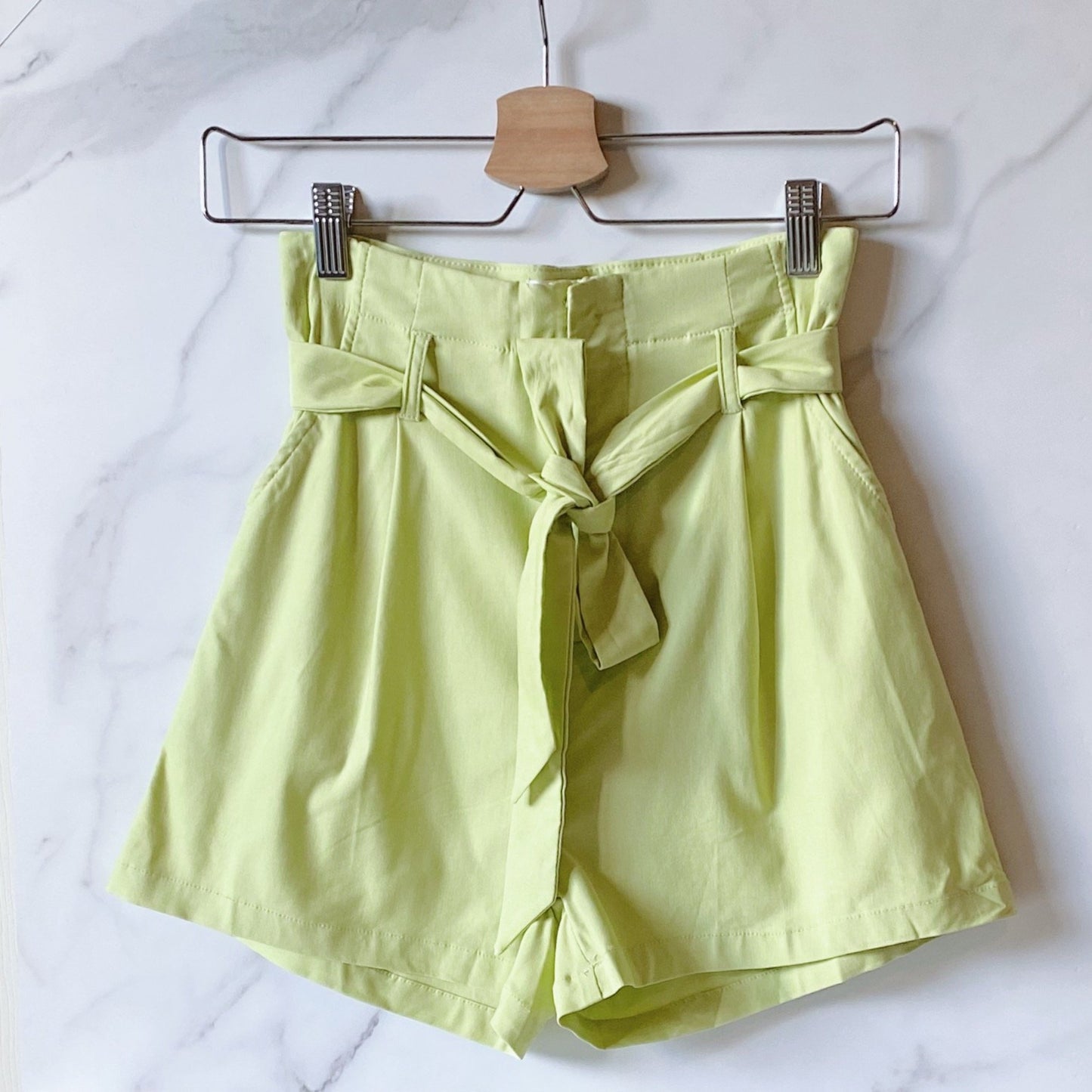 green shorts, high-raised, and paper bag silhouette, Adella shorts, isvi boutique