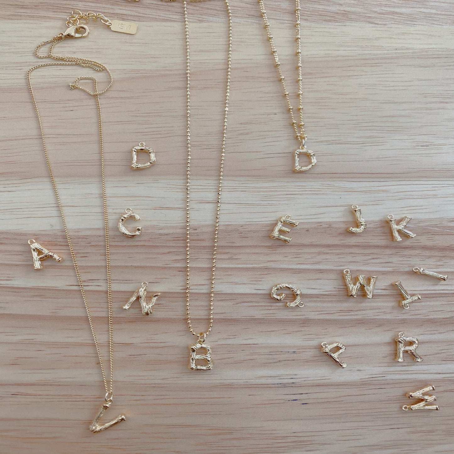 Little “bamboo” initial necklace