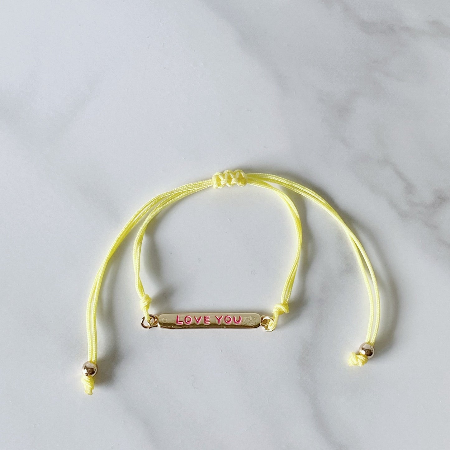 Yellow cotton cord bracelet, and "love you" gold-plated plaque, isvi boutique